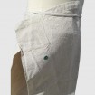 Antique cotton apron with green badge