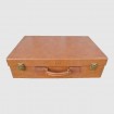 Leatherette suitcase with engraved letters "CFL".