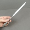 Letter opener in silver plated metal with foliage decoration