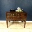 Chinese console with openwork frieze in wood and brass fittings