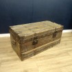 Old flat travel trunk for coffee table