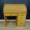 Large pine desk with cylinder & drawers