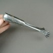 Solid silver sugar tongs with interlaced letters