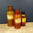 3 Flacons anciens en verre ambre "Produit chimique de Photographie"