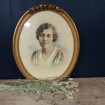 Large 1954 coloured photographic portrait "Lucie" in oval gilded wooden frame with Roses