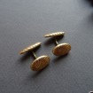 B22 - Pair of gold-plated cufflinks