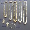 B59 - Old necklace of "olive" shape pearls in falling ivory