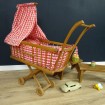 Wooden doll's pram & red check fabric 1955