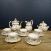 Porcelain tea - coffee set XIXth century with flowers & gilding
