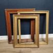 Old wooden frame with blackened wood border