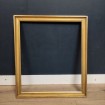 Gilded wooden frame for new frame