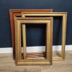 Beautiful antique gilded wooden frame with beads & ribbons