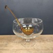Small BIOT bubbled and blown glass punch ladle, amber colour