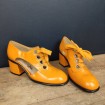 Pair of yellow BOCAGE Vintage 1960 lace up pumps & heels