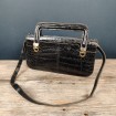 Vintage lady's handbag in black patent crocodile leather