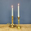 Antique brass candlestick with octagonal base