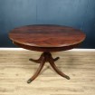 English dining table with mahogany extensions 10 place settings