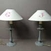 Pair of grey patinated lamp bases with lampshade
