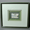 Frame with superposed green mats framing a landscape