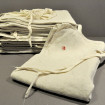 Antique beige cotton apron with red badge