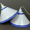 Pair of white suspensions with blue borders