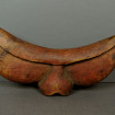 Ancient tribal headrest in African carved wood "Buffalo".