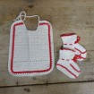 Towel and pair of knitted slippers for dolls