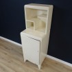 Small old white wooden cupboard with shelves