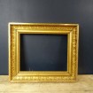 Old gilded wooden frame with Palmettes